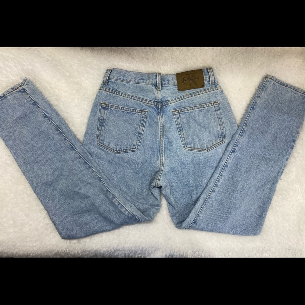 Calvin Klein blue jeans size 10, front zip button fly